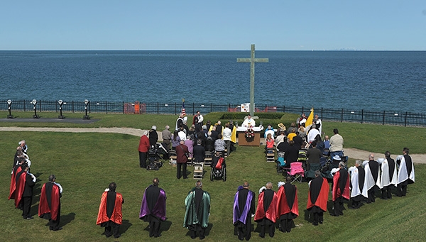 Father Jeffrey L. Nowak, of St. Vincent de Paul Parish, Niagara Falls, presides over the 91st annual Pilgrimage and Mass at the Father Millet Cross at Old Fort Niagara Sept. 10. The Knights of Columbus and area Catholics also celebrated the Mass. Since 1926, the Knights of Columbus have been celebrating a Mass at 